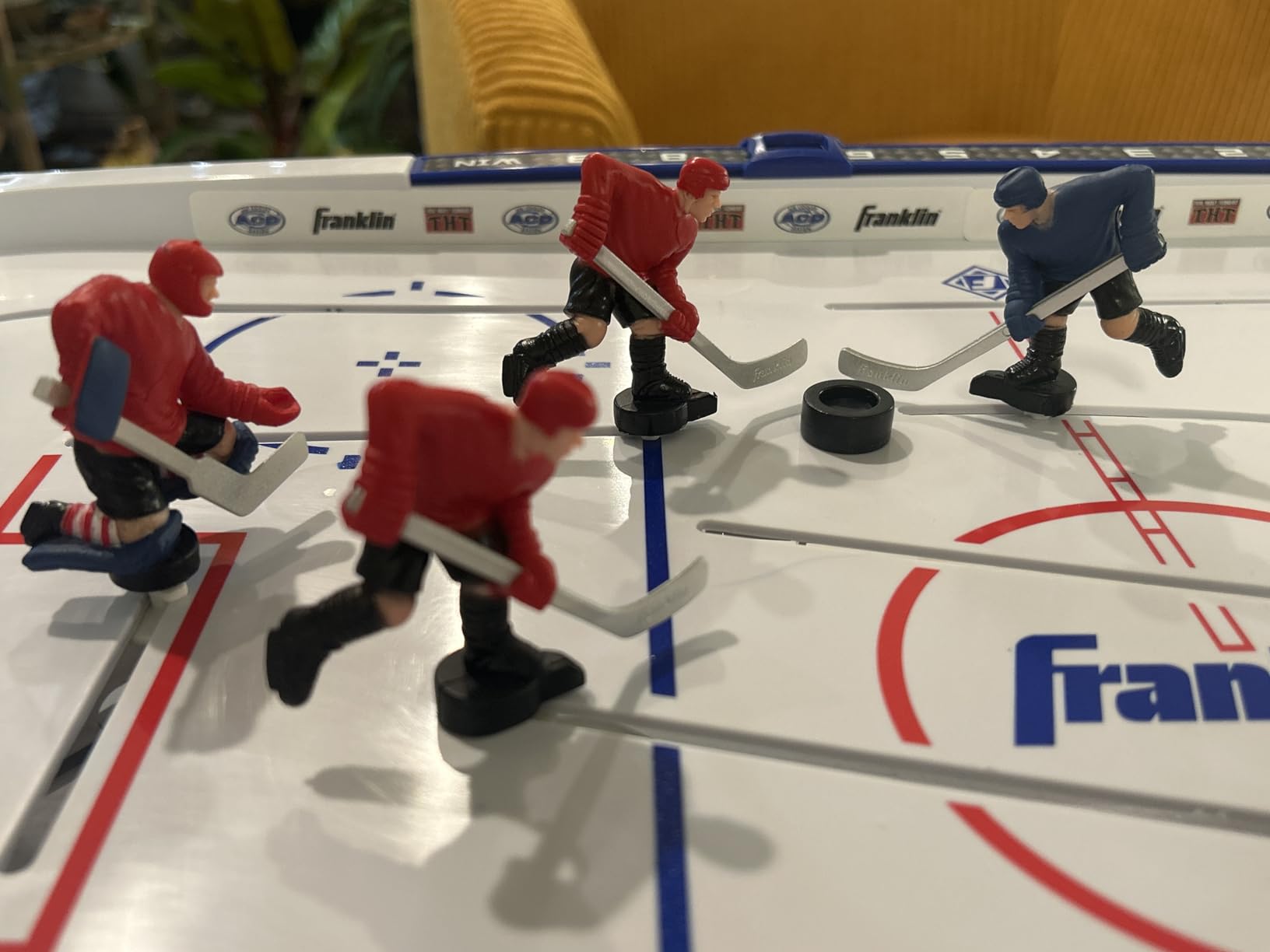 Franklin Sports Tabletop Rod Hockey Game - Gameroom Ice Hockey Table Game for Kids + Adults - Arcade Style Board + Mini Pucks Included customer photo 2