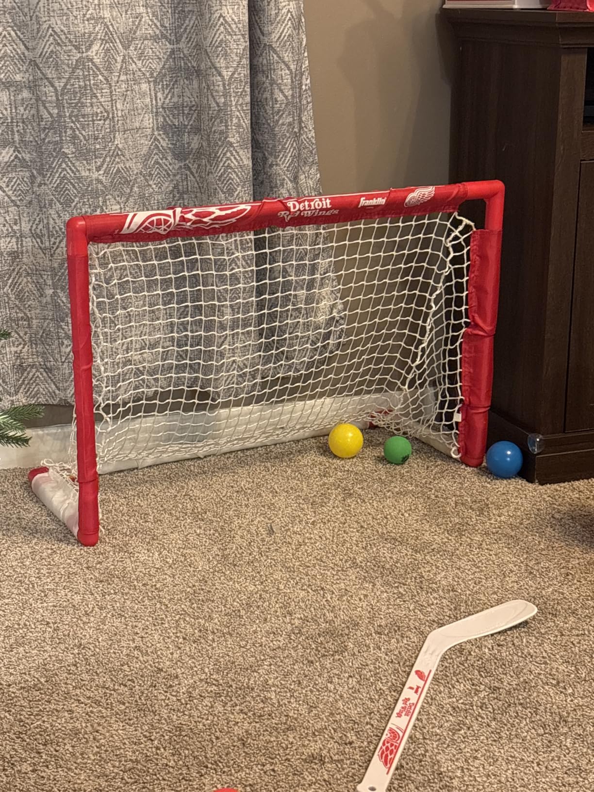 Franklin Sports NHL Mini Hockey Set - Kids Indoor Knee Hockey Goal, Ball, + 2 Stick Combo - Youth Team Indoor Toy Set - Official - Ages 3+ customer photo 1