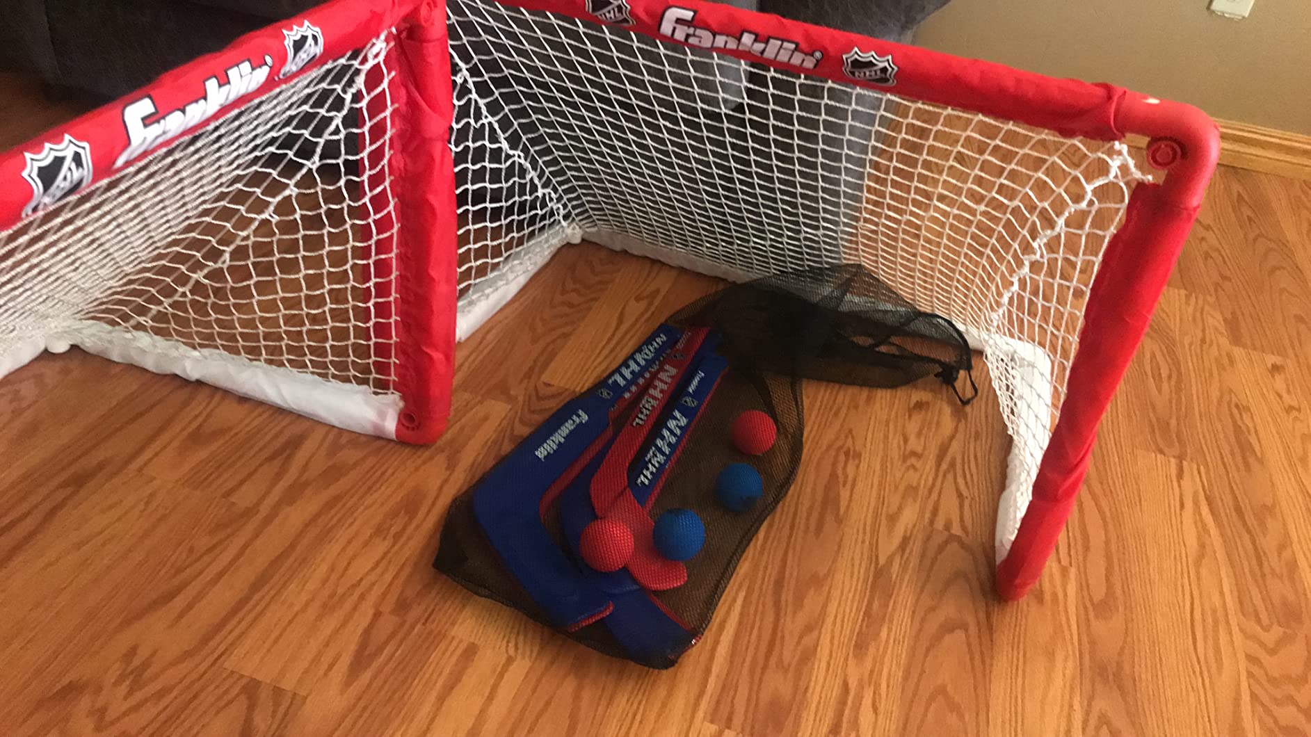 Franklin Sports NHL Kids Mini Hockey Goal Set - (2) Mini + Knee Hockey Goals, (4) Youth Sticks, (2) Goalie Sticks + (4) Foam Balls - Knee + Mini Hockey Set customer photo 1
