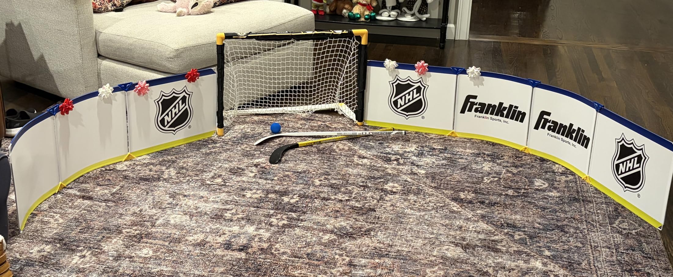 Franklin Sports Mini Hockey Rink Set - Half Rink Knee Hockey Goal, Mini Sticks, and Ball Set - Indoor Mini Hockey Rink - Official NHL Licensed customer photo 1