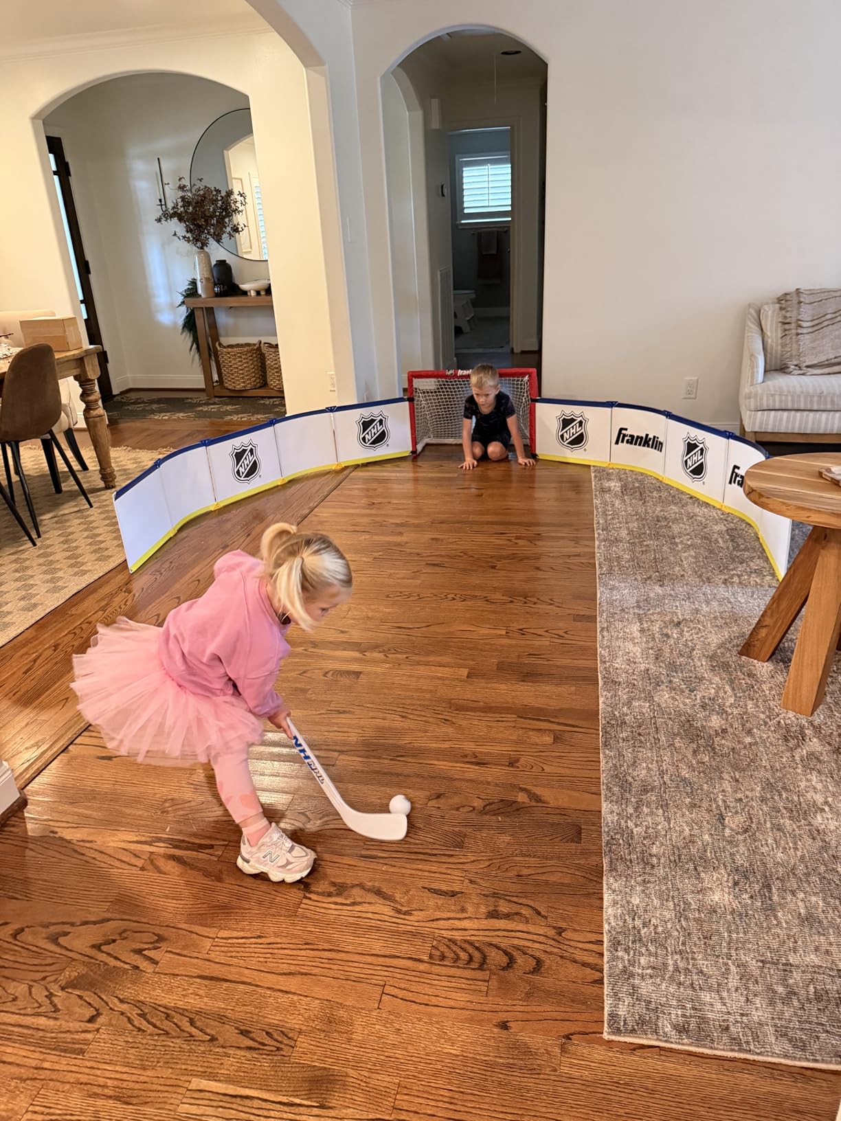 Franklin Sports Mini Hockey Rink Set - Half Rink Knee Hockey Goal, Mini Sticks, and Ball Set - Indoor Mini Hockey Rink - Official NHL Licensed customer photo 2