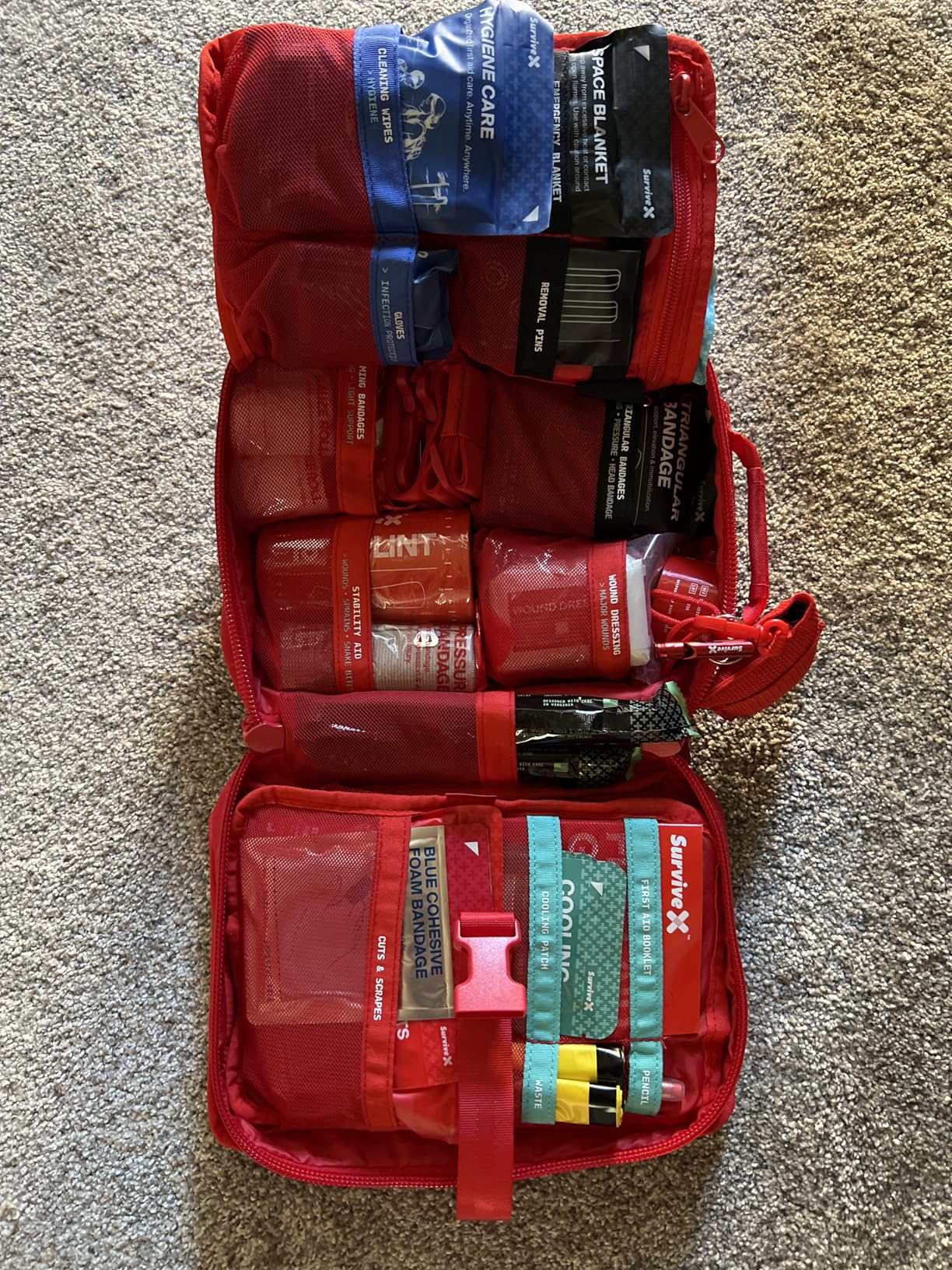 SurviveX Large Pro First Aid Kit for Car, Travel & Home - Emergency Kit for Hiking, Camping, Backpacking and Outdoors - Includes Zip Stitch Wound Closure Strips customer photo 1