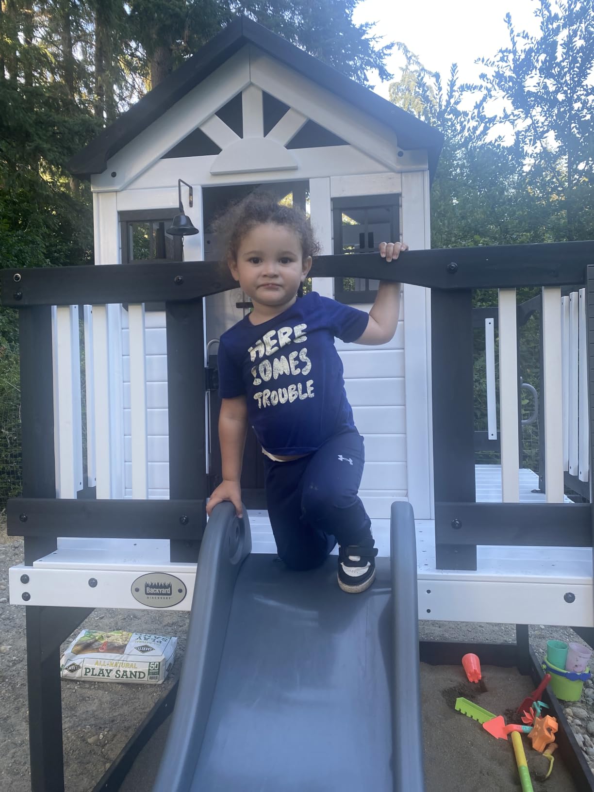 Backyard Discovery Echo Heights Elevated Cedar Wooden Kids Playhouse with Wave Slide, Play Kitchen, Wrap-Around Deck, Flat-Step Ladder, Half Door, Windows, Bell, and Growth Chart for Outdoor Play customer photo 1