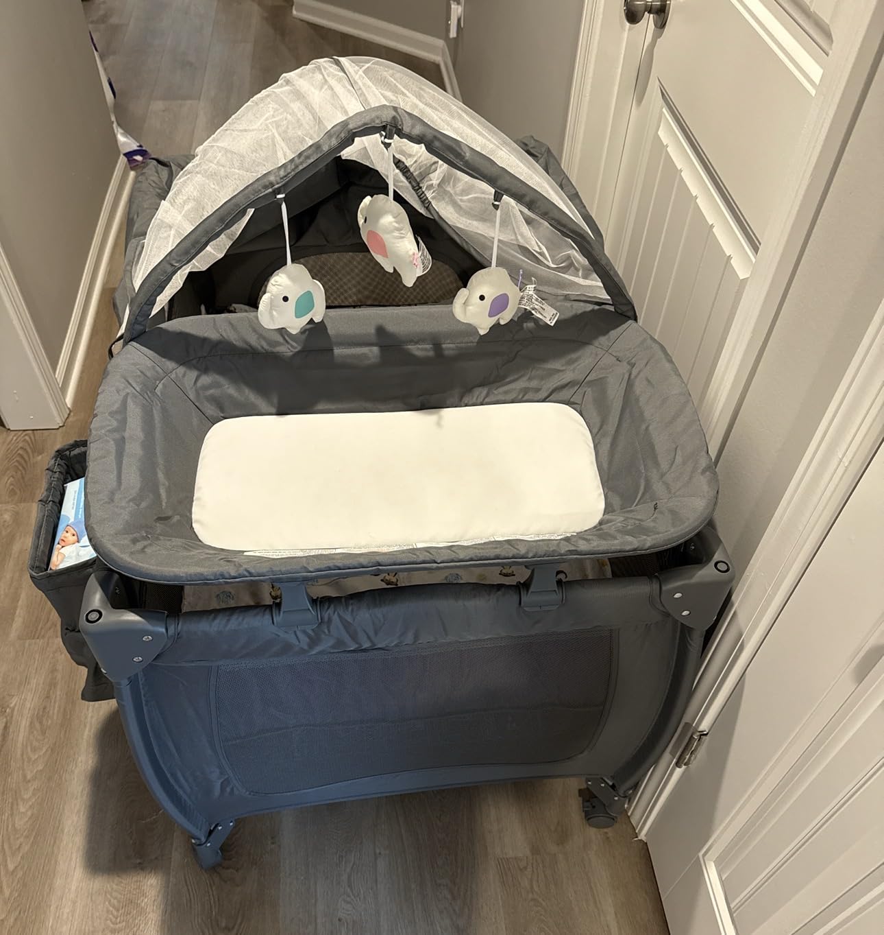 Pamo Babe 7 in 1 Pack and Play with Bassinet, Portable Crib with Mattress, Diaper Changer, Magic Fold One-Step Quick Setup Playard, Mosquito Net, Zipper Door, Toy Arch for Newborn to Toddler customer photo 1