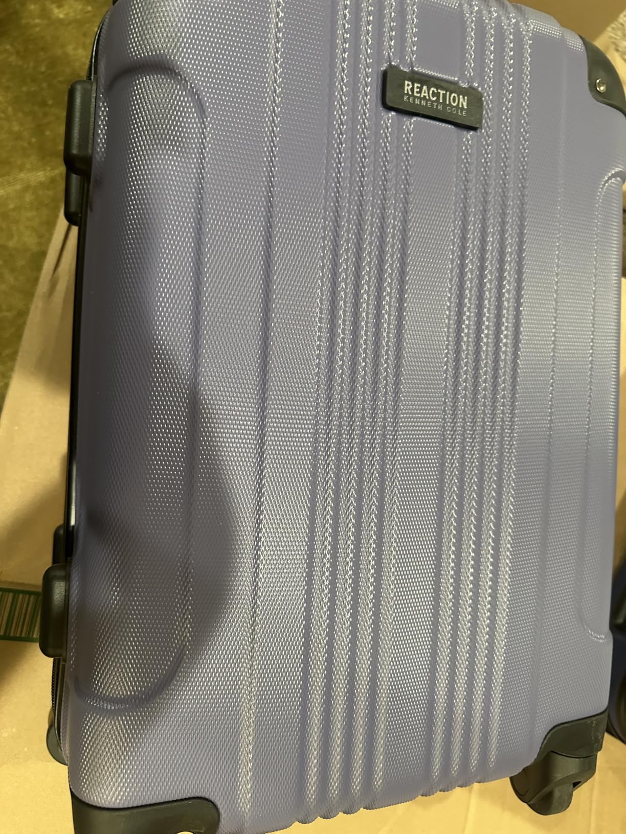Kenneth Cole REACTION Out of Bounds Lightweight Hardshell 4-Wheel Spinner Luggage, Charcoal, 28-Inch Checked customer photo 1