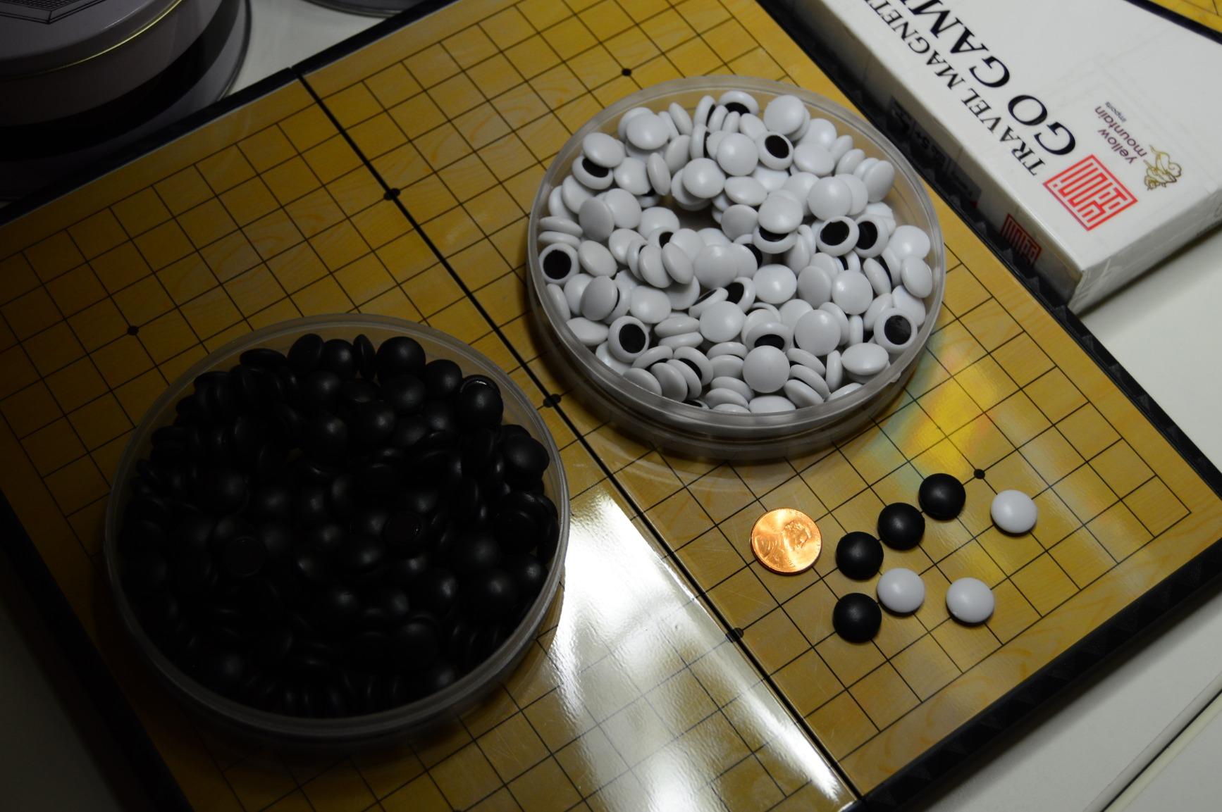 YMI Magnetic Travel Go Game Set, 11-Inch Compact 19x19 Board, 361 Stones | 19x19 magnetic Go set, 11 x 11 x 0.6 in folding board, 361 magnetic stones, 2 bowls, weighs 1.72 lbs. customer photo 2