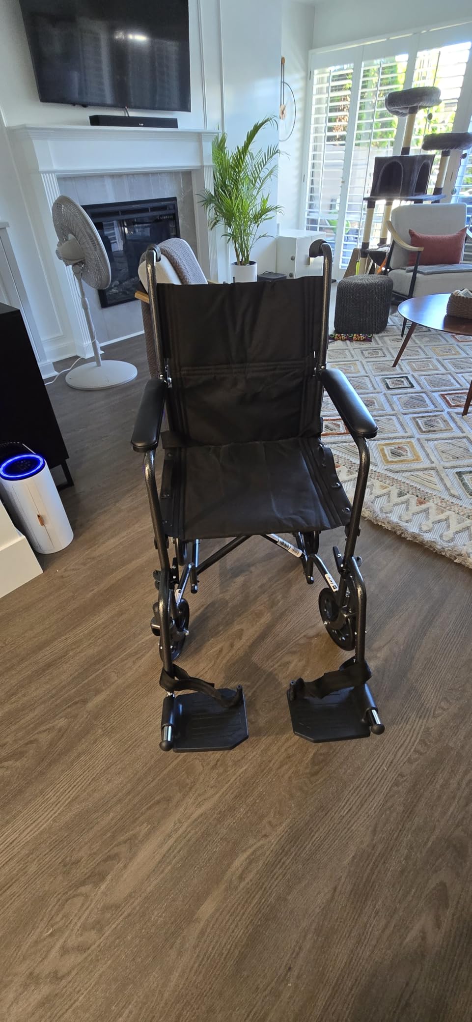 Medline Durable Folding Steel Transport Wheelchair with Swing-Away Footrests, 19-Inch Seat Width, Black Frame, Black Upholstery customer photo 2