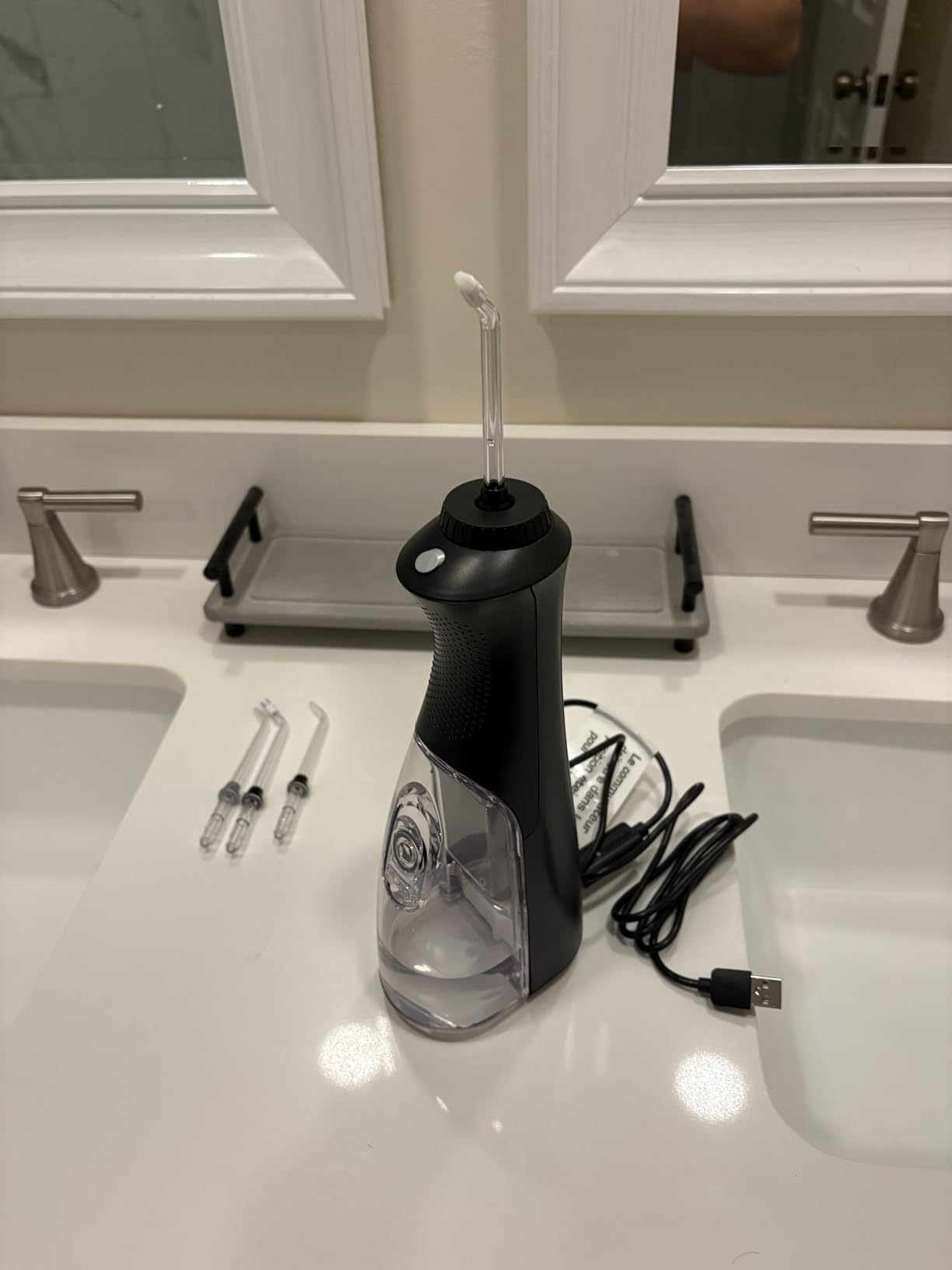 Waterpik Cordless Pearl Rechargeable Portable Water Flosser for Teeth, Gums, Braces Care and Travel, Extra Quiet, 4 Flossing Tips - ADA Accepted, WF-13 White, Amazon Exclusive customer photo 2