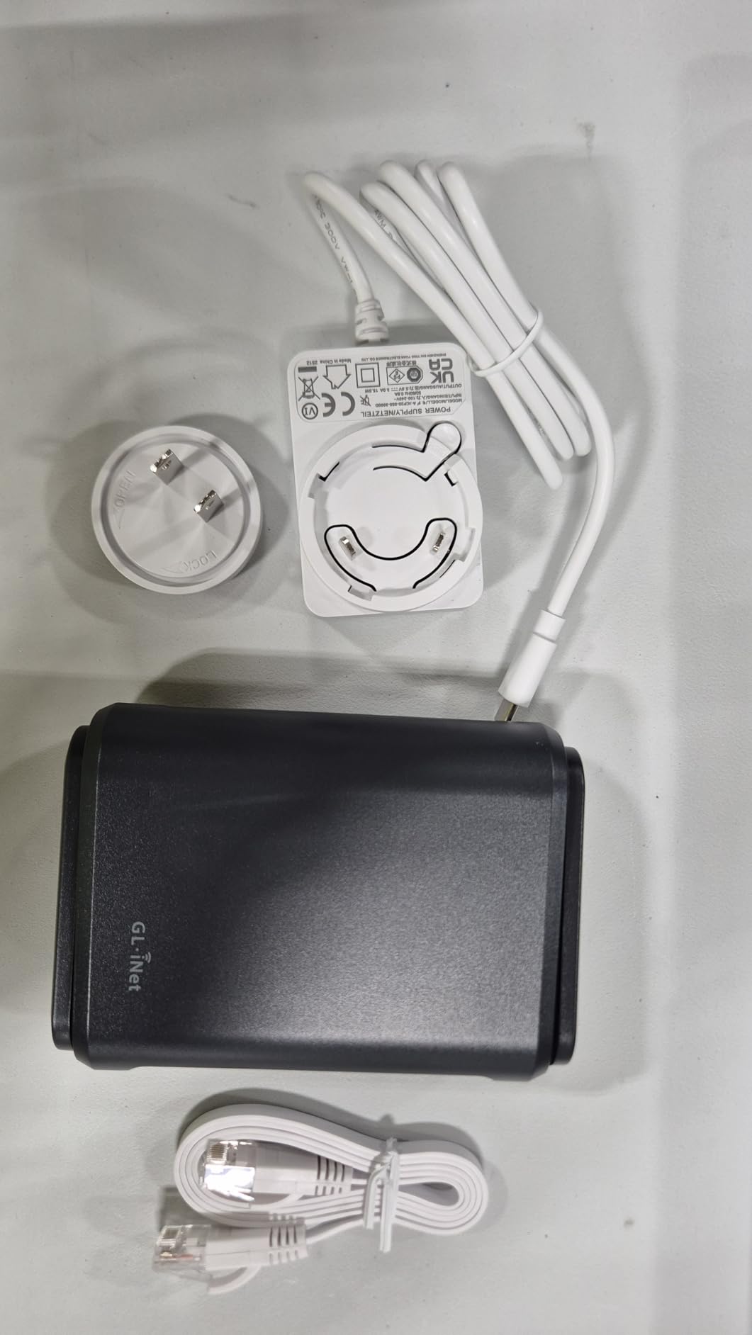 GL.iNet GL-A1300 Pocket VPN Travel Router - Portable Wi-Fi Router for Travel, Easy to Set up, Connect to Public & Hotel Wi-Fi login Page | Built-in VPN client and server for 30+ providers, AdGuard Home ready for ad blocking, repeater mode for hotel and RV Wi-Fi customer photo 2