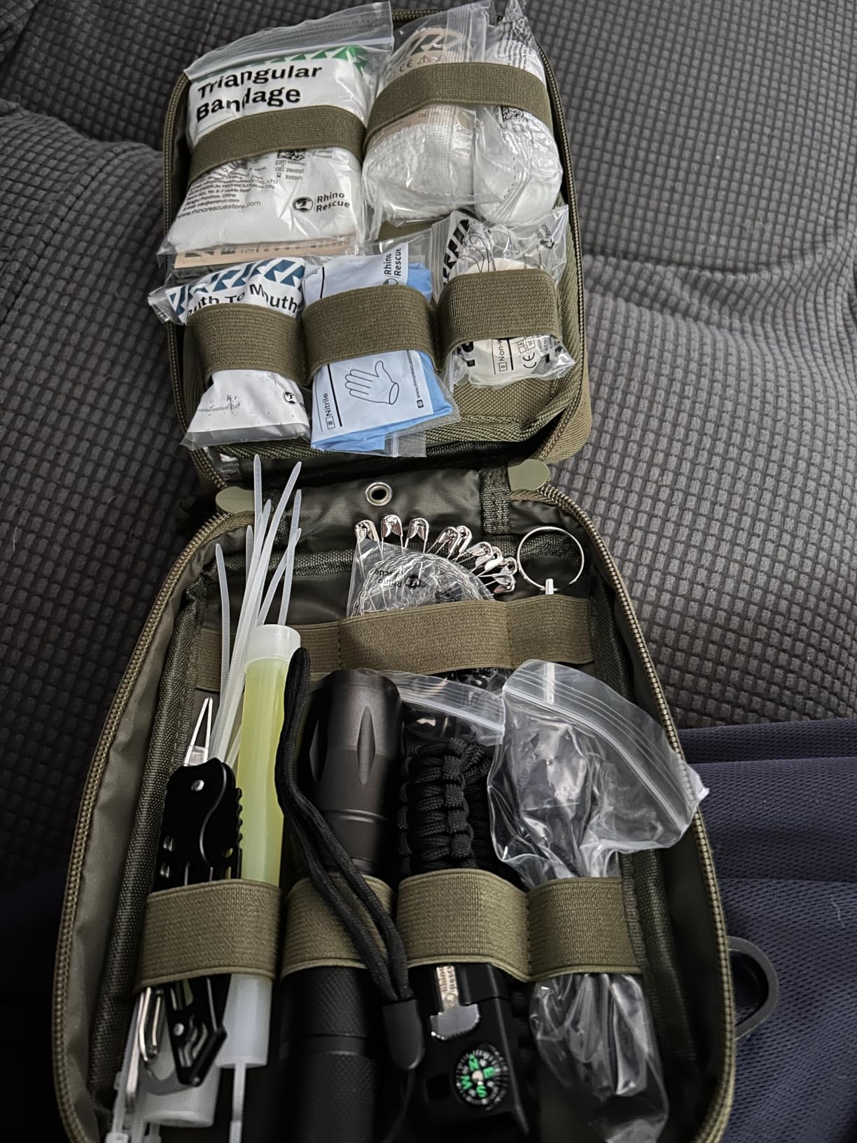 RHINO RESCUE Survival First Aid Kit for Hiking, Backpacking | Portable Size, IFAK Molle Pouch, Essential Outdoor Gear, 100+ First Aid Supplies, 20+ Survival Essentials, HSA/FSA Approved customer photo 1