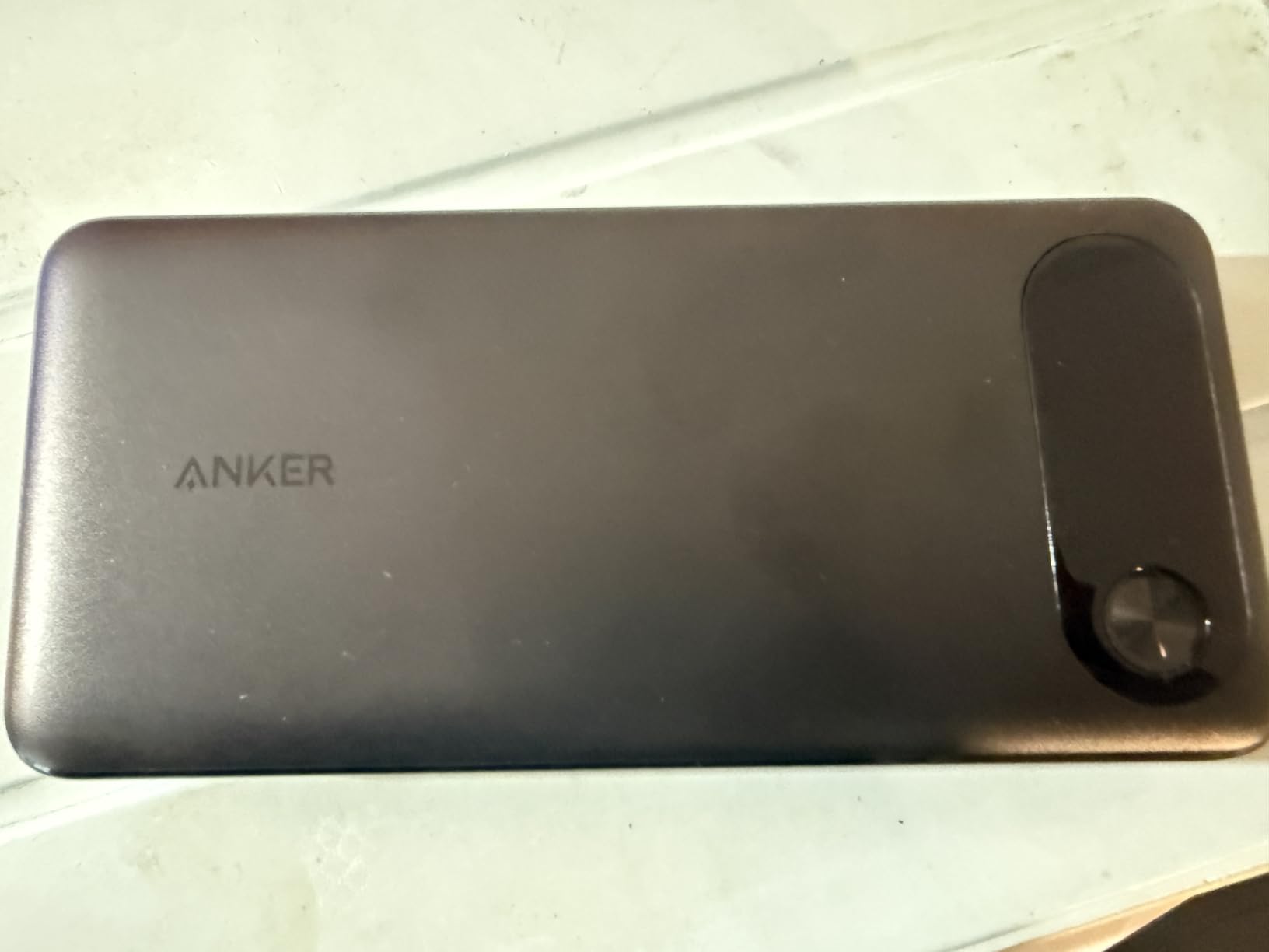 Anker Power Bank, 20,000mAh Travel Essential, Built-in USB-C Cable(Black) | 3-Port 87W Max Fast Charging Battery Pack, for MacBook, iPhone 16 / 15 Series, Samsung, Switch, and More customer photo 1