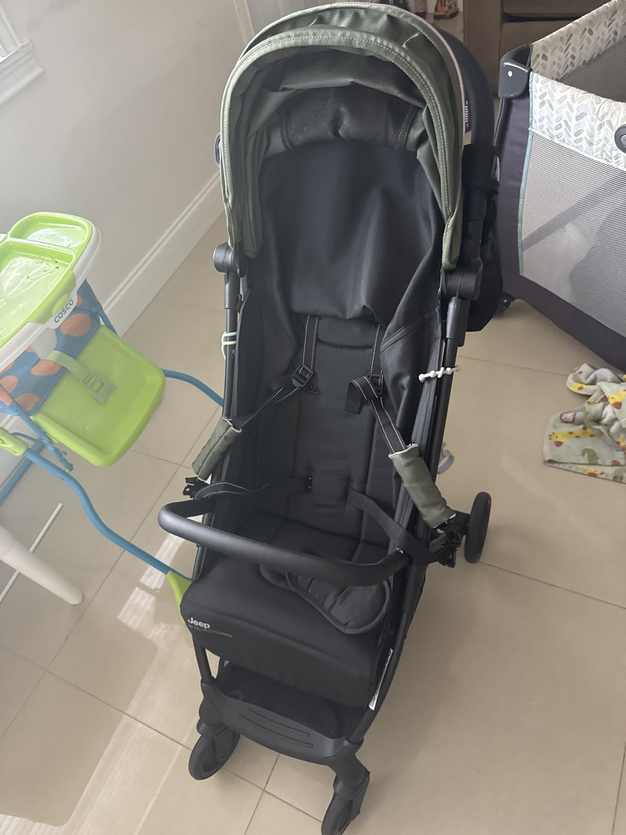 Jeep Altitude Compact Travel Stroller by Delta Children Greenguard Gold, Easy One Hand Fold, Lightweight, Extendable Canopy with Peek-a-Boo Window, Reclining Seat, 4 Wheel Suspension, Black customer photo 1