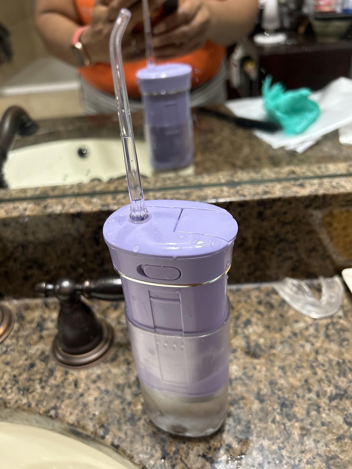 GuruNanda Portable Water Flosser Cordless, Sensitive Gums Friendly, 1ct | Travel Water Flosser|Collapsible 180mL|4 Modes|Smart Timer|Built-In Tip Storage|Mini Water Flosser|30-Days Battery|Lavender customer photo 1