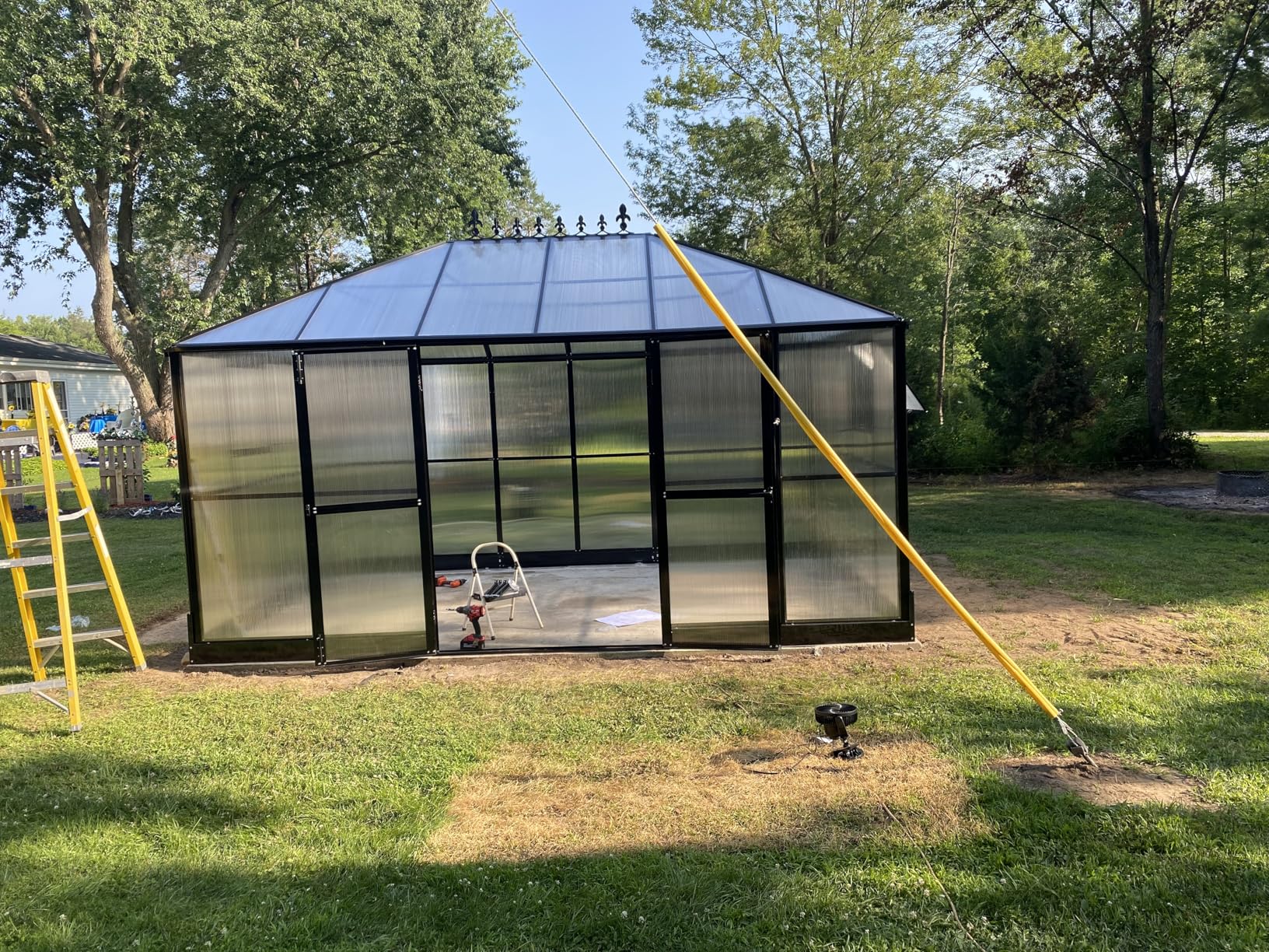 HOWE 16x12x9.5 FT Polycarbonate Greenhouse for Outdoors, Pavilion Style Greenhouse with 4 Vent Windows, Lockable Double Doors, Ideal for Garden & Patio Use, Black customer photo 2