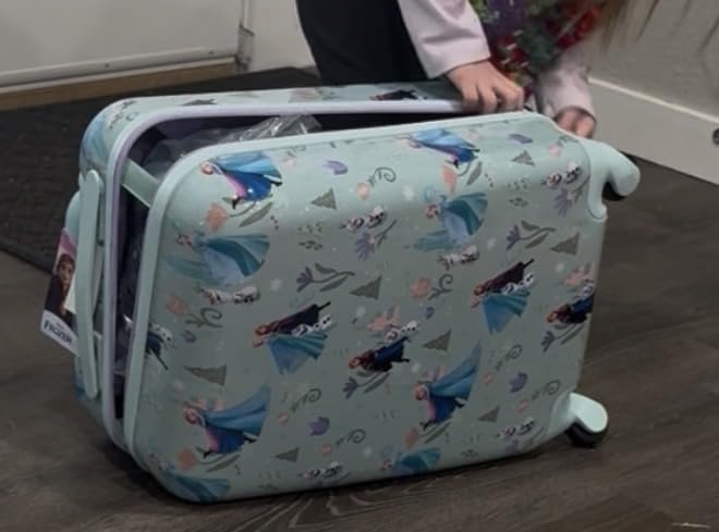 American Tourister Minnie Mouse Carry-On Luggage - Airline Approved, Durable Hardshell with Vibrant Minnie Mouse Design - Roll Confidentially with Spinner Wheels & Colorful Adjustable Handle customer photo 1