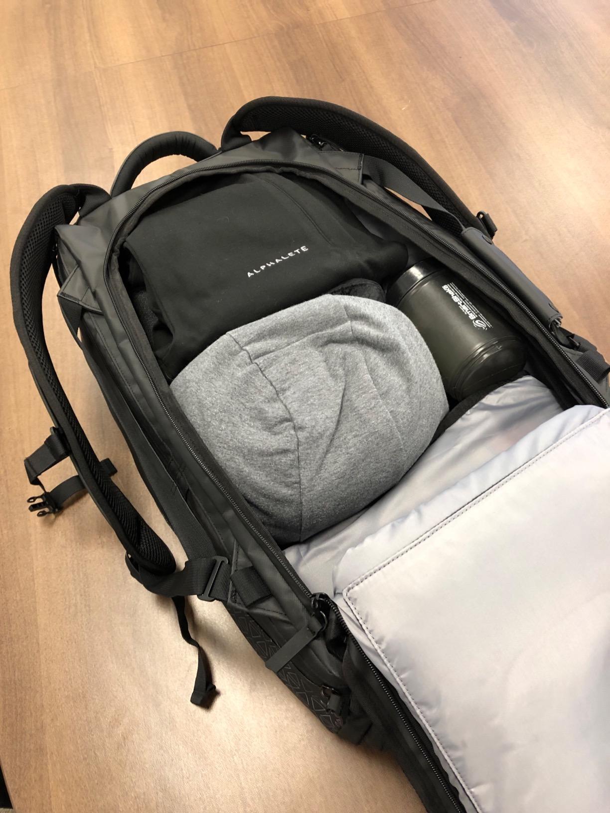 NOMATIC 40L Travel Bag - Duffel Bag For Men and Women | Convertible Duffel/Backpack, 12 Pockets, Water-Resistant, Carry-On Size, Laundry Bag Included, Fits 16
