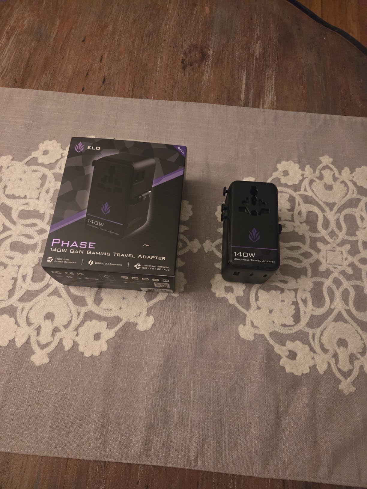 ELO Phase 140W Universal Gaming Travel Adapter, GaN, International Plug | 140W GaN fast charging, 2 USB-C and USB-A, retractable USB-C cable, US UK EU AUS plugs, works in 200+ countries customer photo 1