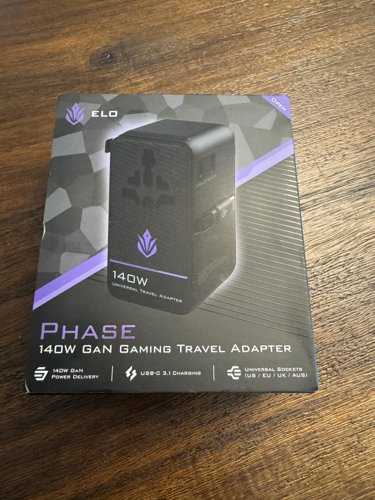 ELO Phase 140W Universal Gaming Travel Adapter, GaN, International Plug | 140W GaN fast charging, 2 USB-C and USB-A, retractable USB-C cable, US UK EU AUS plugs, works in 200+ countries customer photo 2