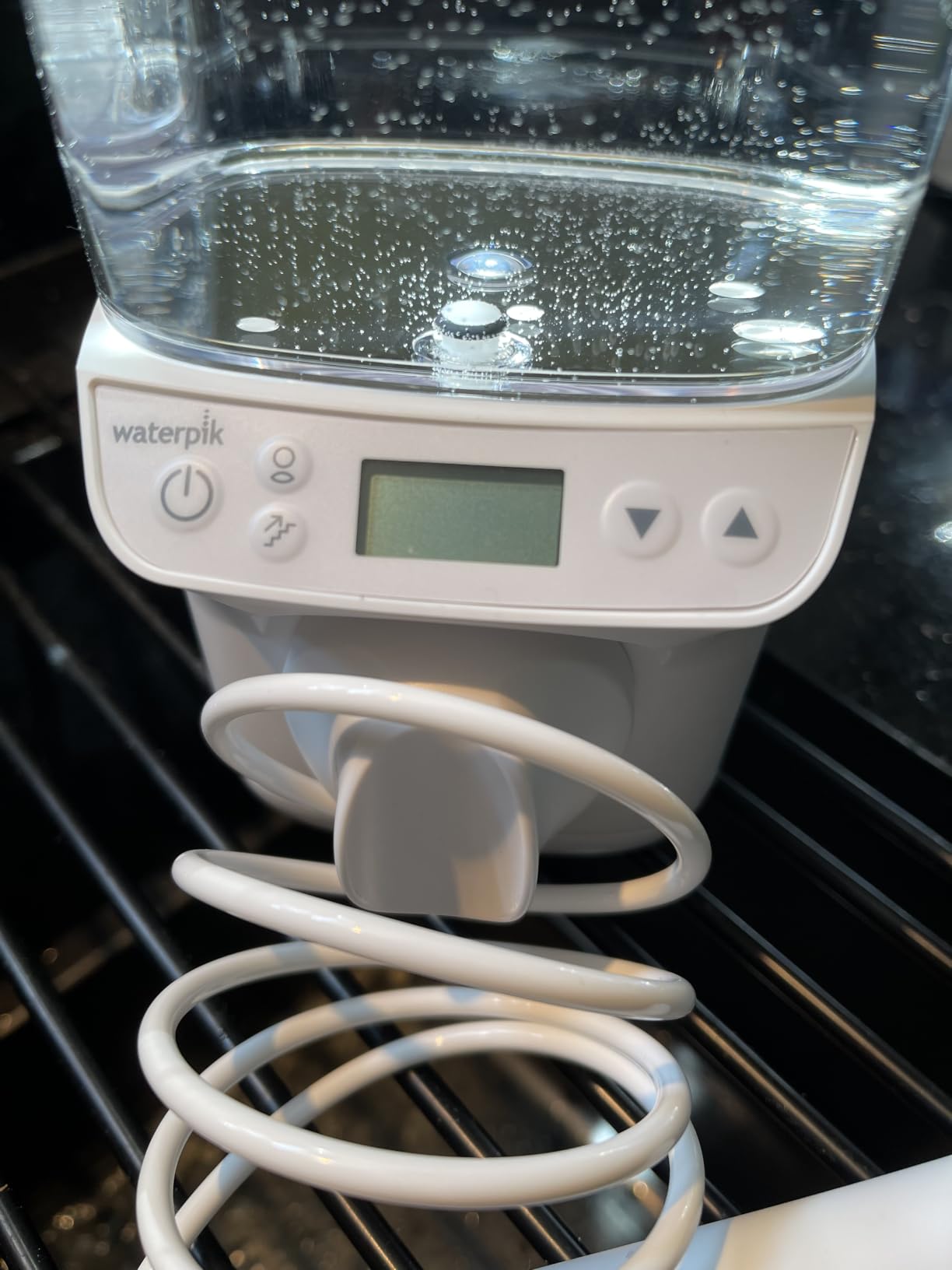 Waterpik Promax Countertop Water Flosser, SmartAdvance, 10 Settings, 5 Tips | ADA Accepted, WF-23 customer photo 1