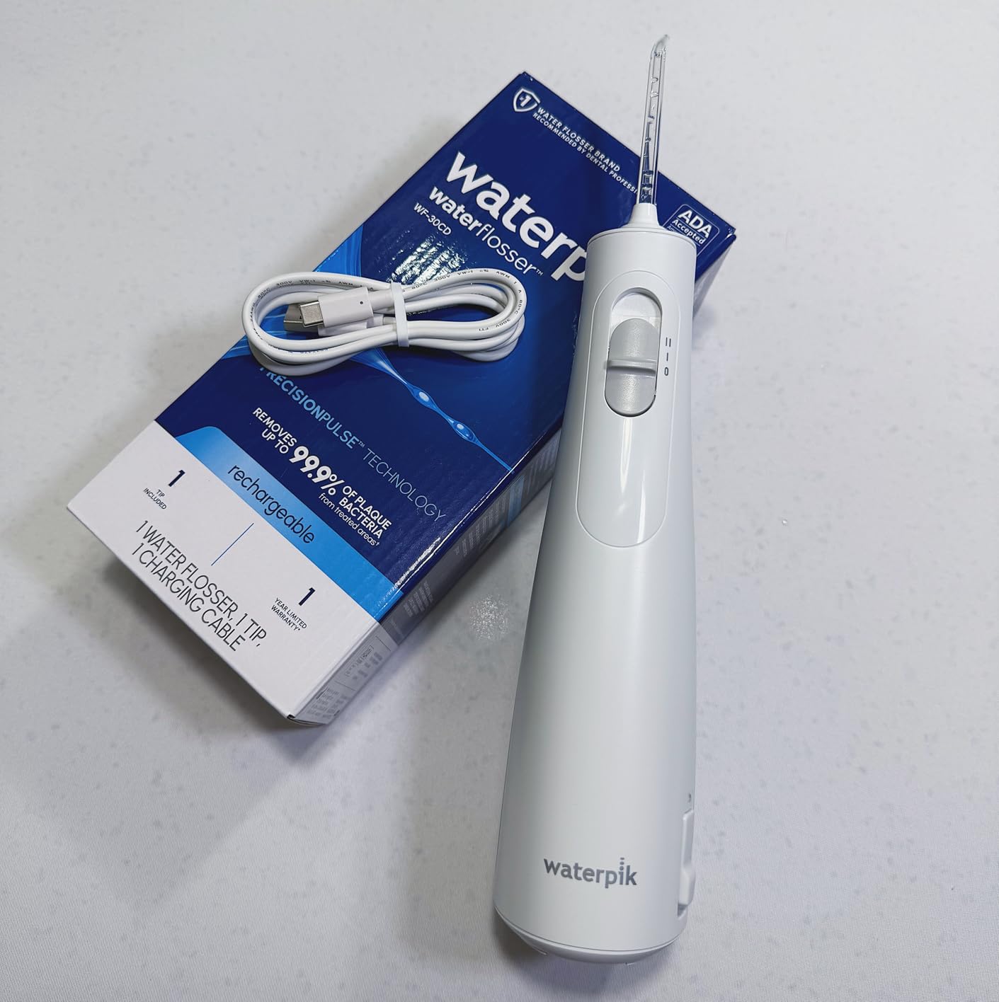 Waterpik Cordless 1100 Rechargeable Portable Water Flosser for Teeth Cleaning and Flossing, Travel, Braces Care, Healthier Gums, Waterproof for Shower, ADA Accepted, WF-30CD Black, Packaging May Vary customer photo 2