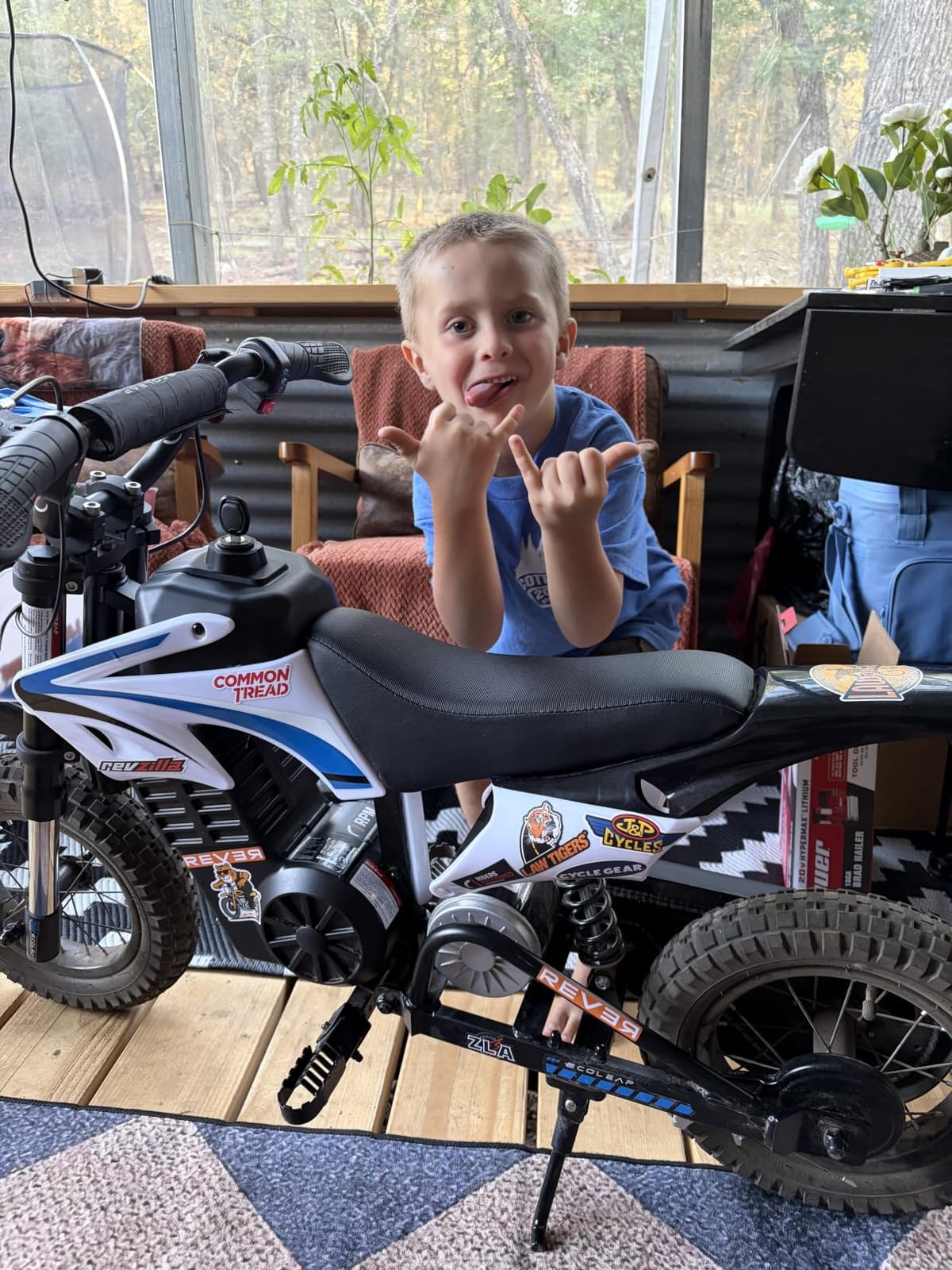 K1 Kids Electric Dirt Bike, 36V, 700W, 16 MPH, 14-Mile, Ages 3-10 (Sky Blue) customer photo 1
