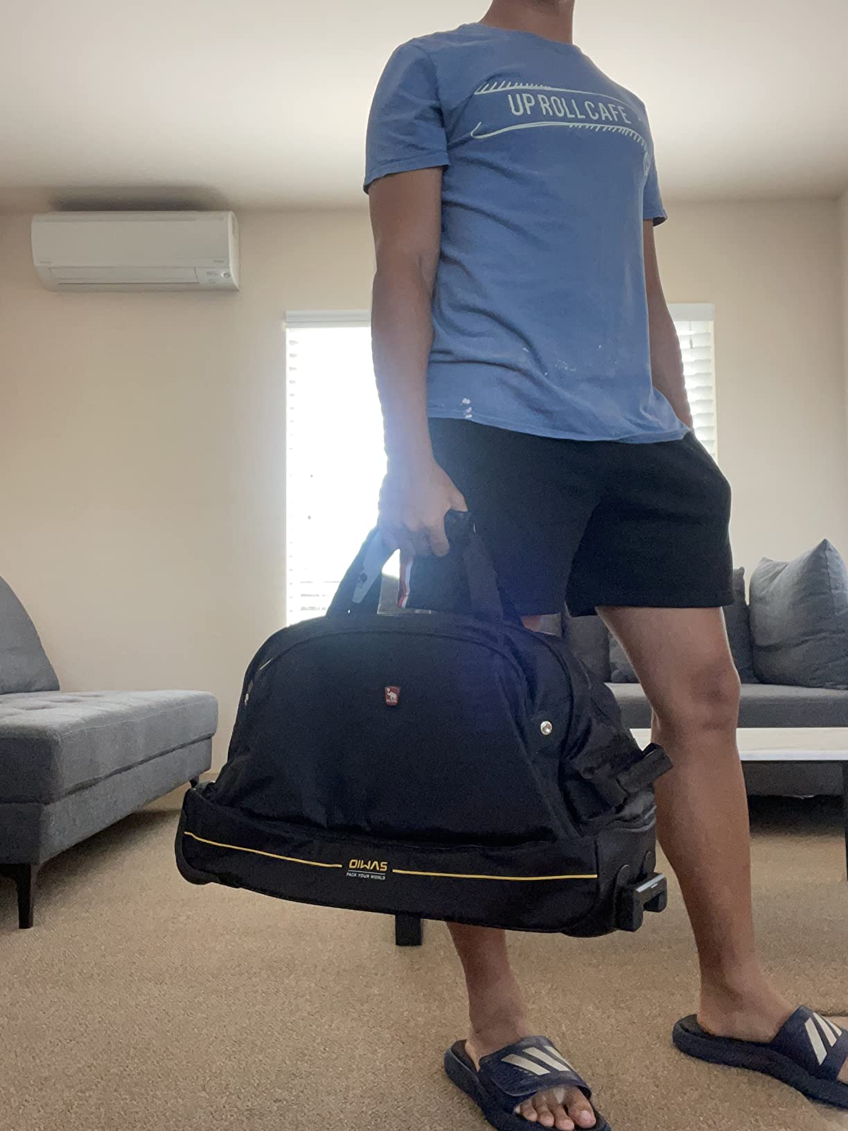 OIWAS Rolling Duffle Bag with Wheels, 22 inch Carry On Bag for Travel | Wheeled Duffel Bags for Weekender Overnight, Expandable 50L to 60L, Rolling Gym Bag for Sport, for Women Men, Water-Resistant customer photo 1