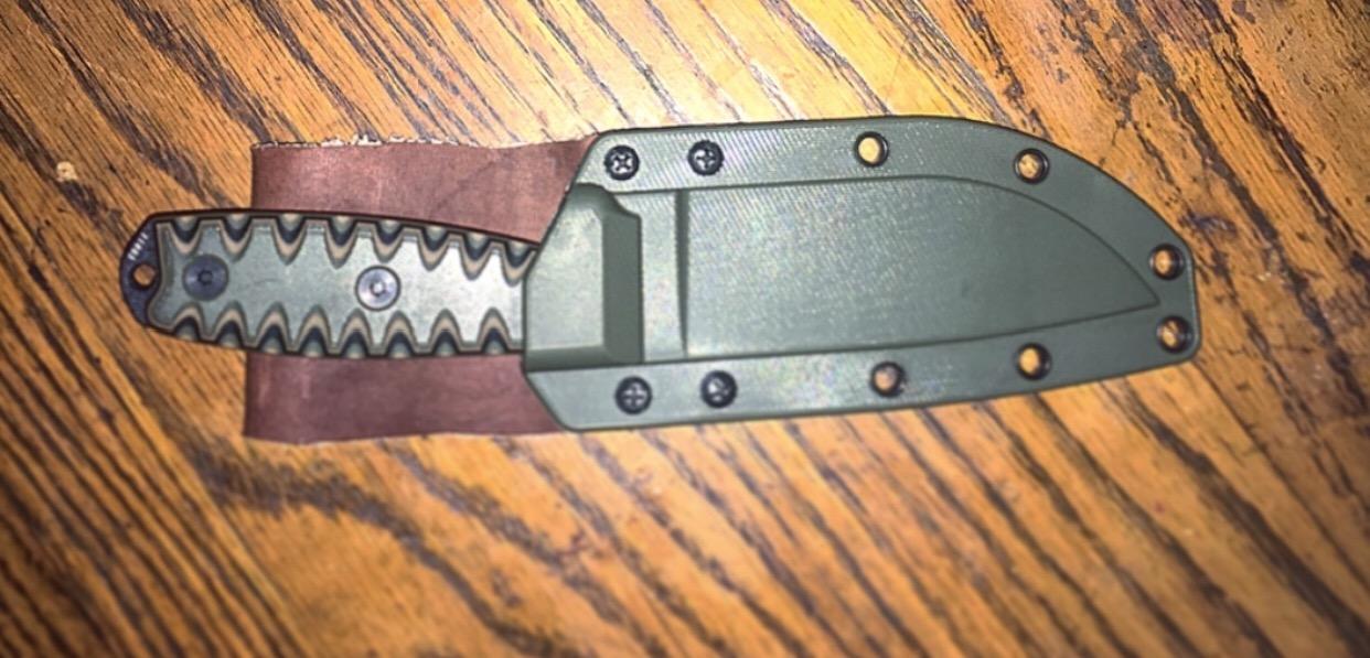 ESEE 4P Survival Fixed Blade Knife, OEM Sawtooth Handle Design, Black Sheath customer photo 1
