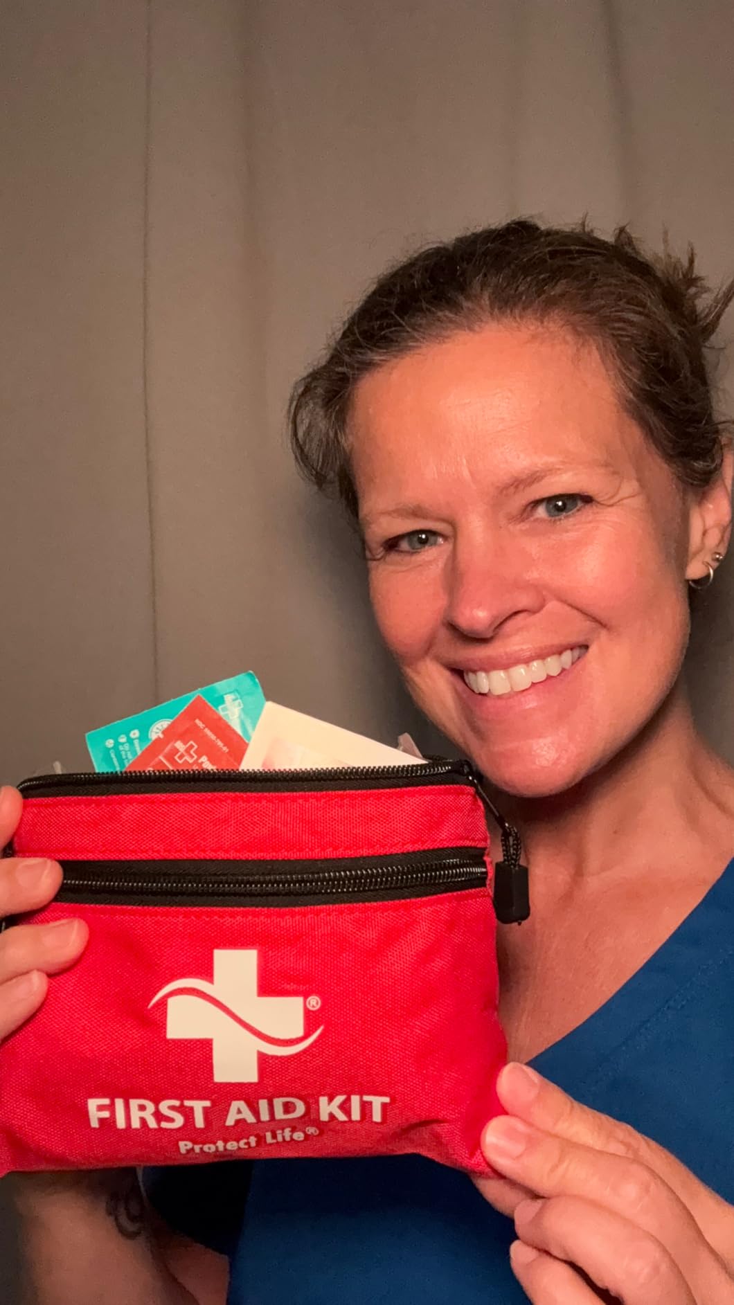 Protect Life Travel First Aid Kit for Car - Small Mini Emergency Kit, 100 Piece Waterproof First Aid Kit for Home, Camping, Boat & Hiking - Includes Emergency Blanket & First Aid Guide customer photo 2