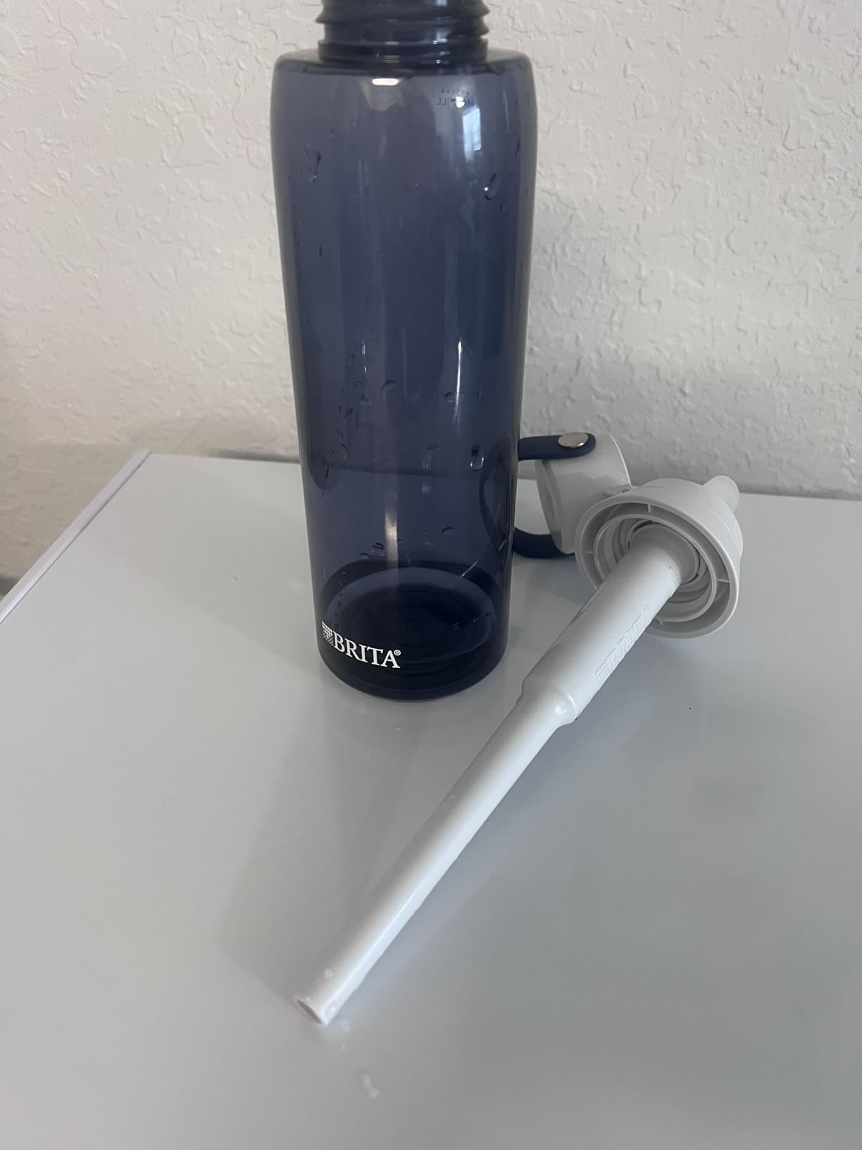 Brita Hard-Sided Plastic Premium Filtering Water Bottle, BPA-Free, Reusable, Replaces 300 Plastic Water Bottles, Filter Lasts 2 Months or 40 Gallons, Includes 1 Filter, Blush - 26 oz customer photo 1