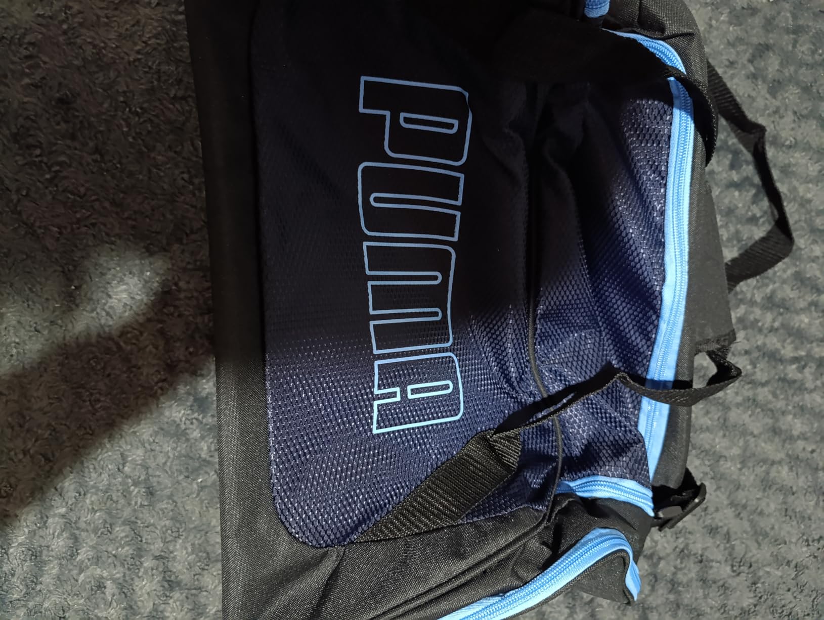 PUMA unisex-adult Form Factor Duffel with Adjustable Strap, Padded Bottom & Zip Pockets customer photo 2