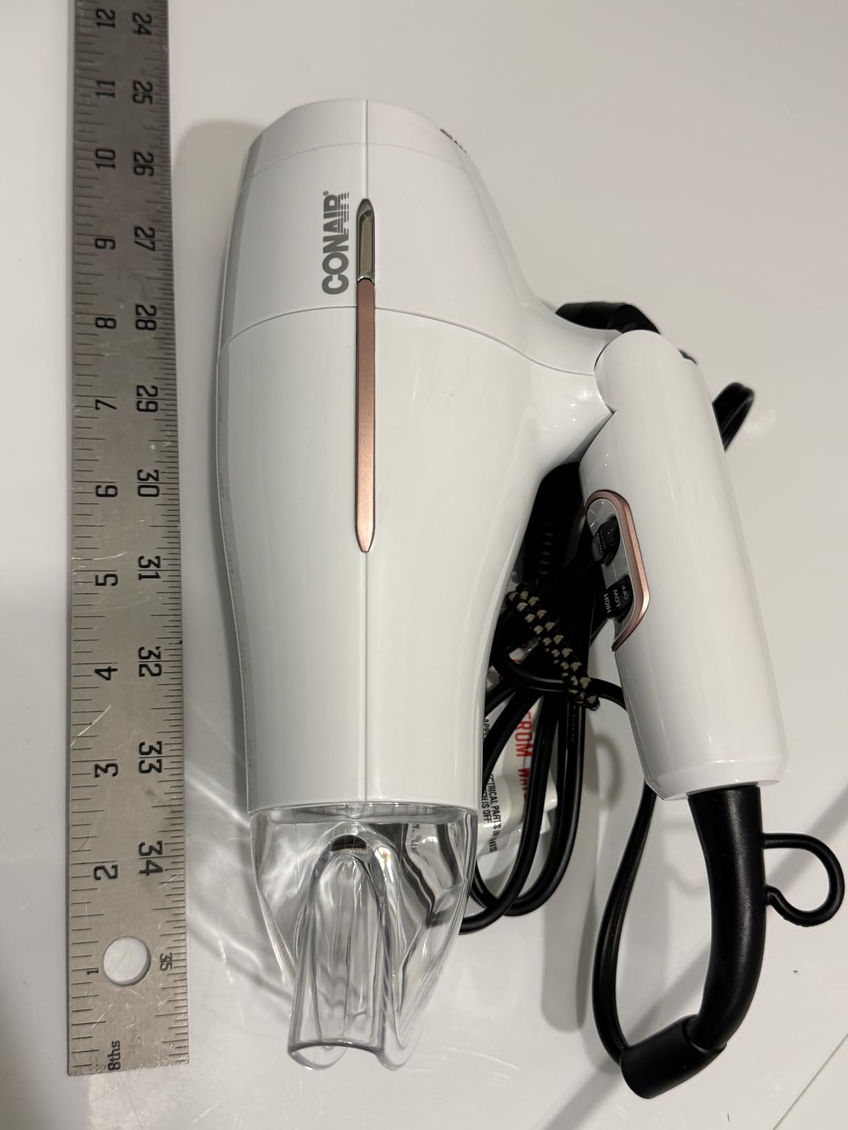 Conair Worldwide Folding Handle Hair Dryer with Concentrator & Diffuser, 1875W Travel Blow Dryer with Smart Voltage Technology, Ionic Conditioning Fights Frizz, 3 Heat & 2 Speed Settings, Purple customer photo 2