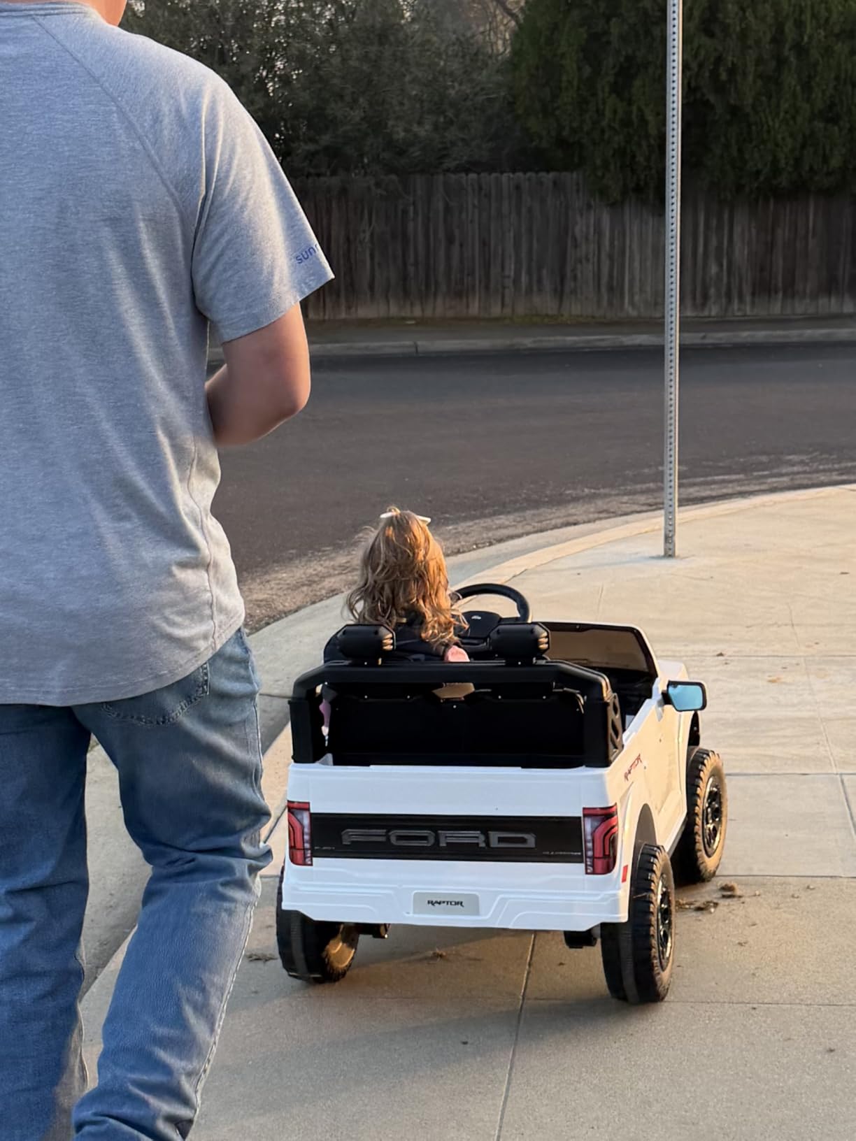 First Ride On 24V Kids Ride On Truck, Licensed Ford F-150 Raptor 2 Seater Electric Car w/Remote Control, Toddler Ride On Car Toys w/LED Lights, Bluetooth, Music, Truck Bed Storage, Soft Start (White) customer photo 1