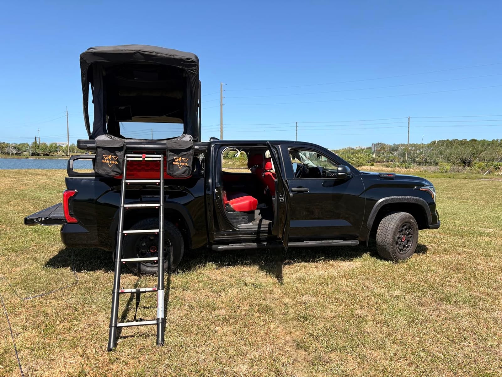 SanHima Rooftop Tent Hard Shell, Aluminium Fold-Out SUV Truck Roof Top Tent | 131.5 LBS Lightweight, w/ Digital Panel & Tri-Color LED Strip Light, for Car SUV Truck Camping, 2-3 People customer photo 1