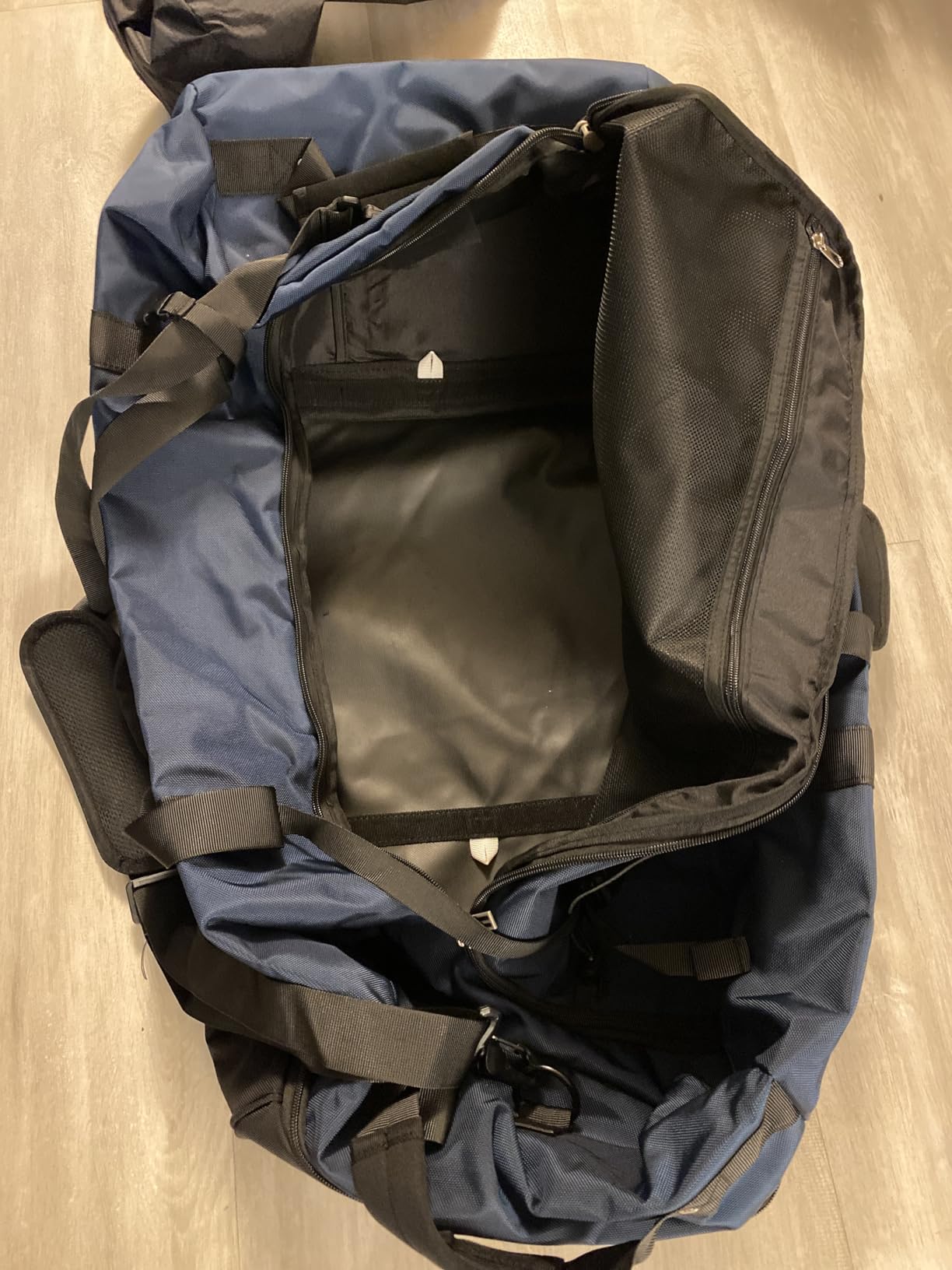 Rolling Duffle Bag with Wheels,110L/140L Expandable Soft-Sided Foldable Duffle Bag with 2 Rubber Wheels,Packable 32” Rolling Carry-On with Pockets & Compartments (Dark blue) customer photo 1