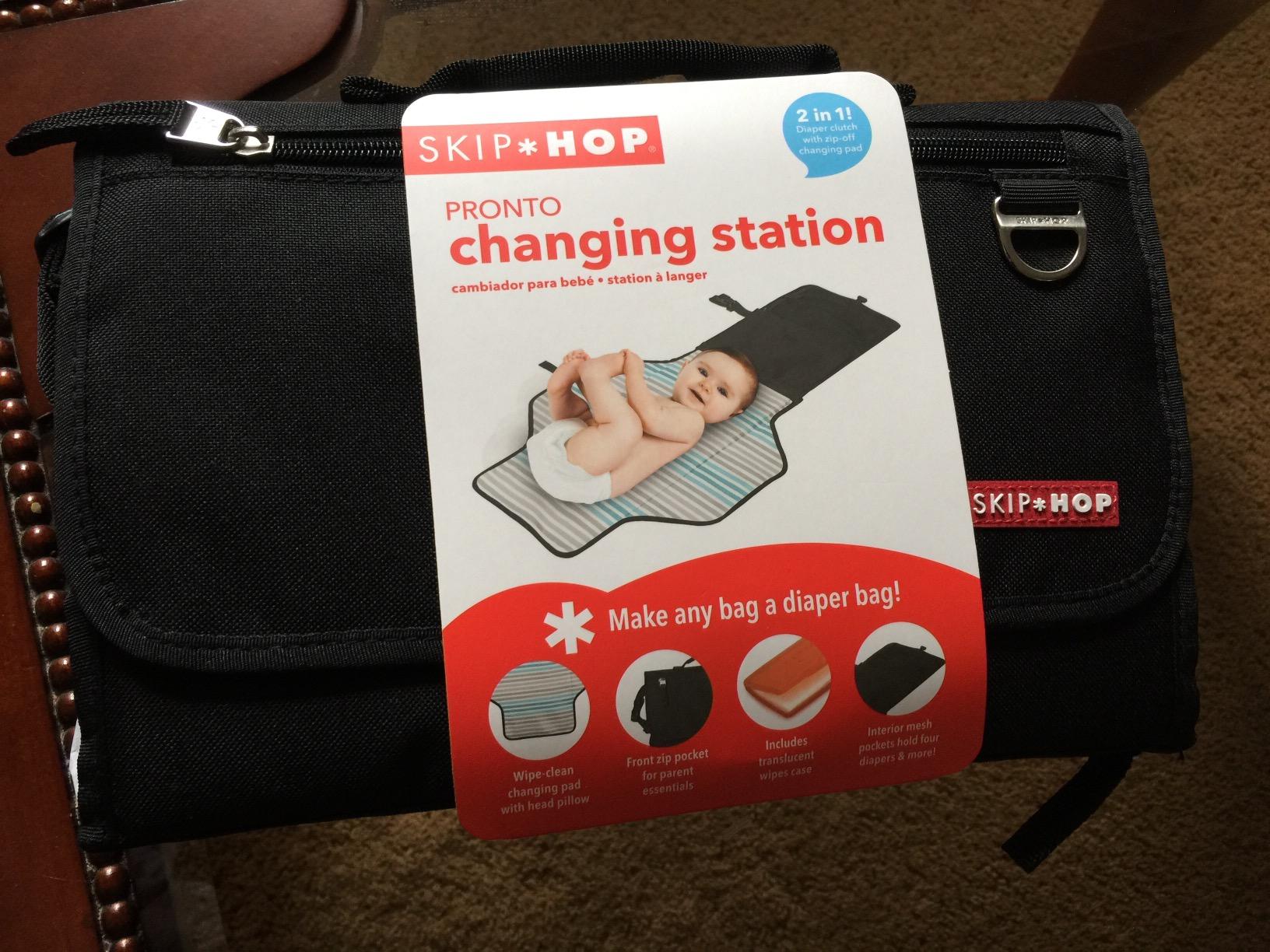 Skip Hop Travel Baby Changing Pad with Easy-Clean Surface, Covers Public Changing Stations, Wipes Pocket, Diaper Storage, Disposable Bag Dispenser and Magnetic Wipes Pocket, Clean Slate, Oat customer photo 2