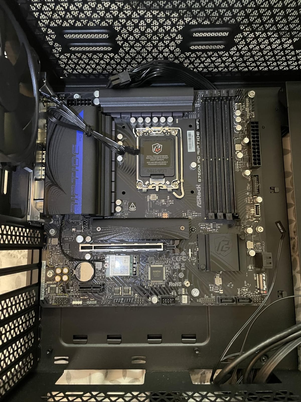ASRock B760M PG Riptide WiFi Micro-ATX Motherboard | Supports 14th/13th/12th Gen Intel | DDR5 7200+ (OC) | WiFi 6E | 2.5G LAN | 14+1+1 Power Phase | Front & Rear USB-C customer photo 2